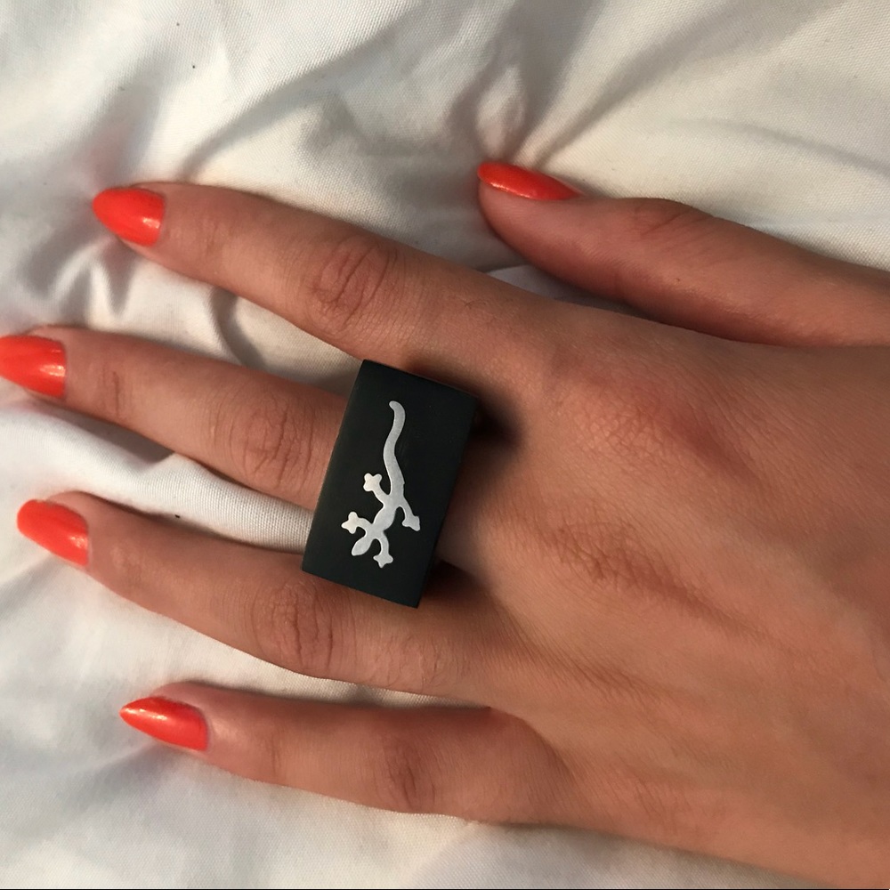 Black ring with silver lizard